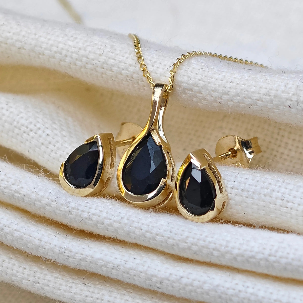 Sapphire jewellery – 9ct gold necklaces, earrings – designed in the UK