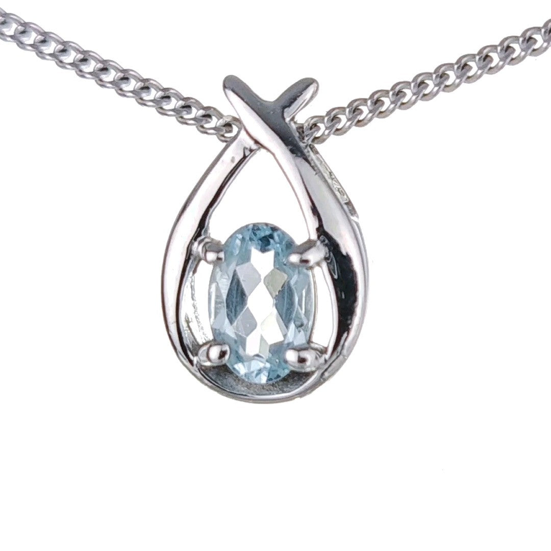 topaz necklace 0.5ct pear blue twist pendant silver december birthstone designed in the UK
