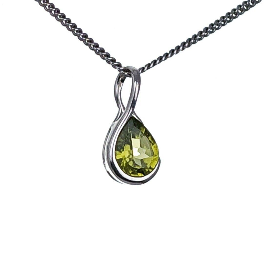 peridot pendant sterling silver infinity loop designed in the UK