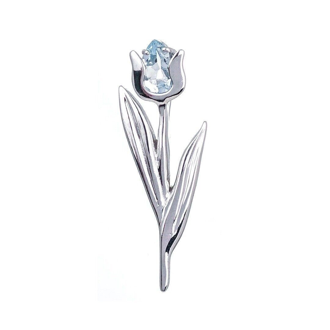sterling silver blue topaz tulip brooch designed in the UK