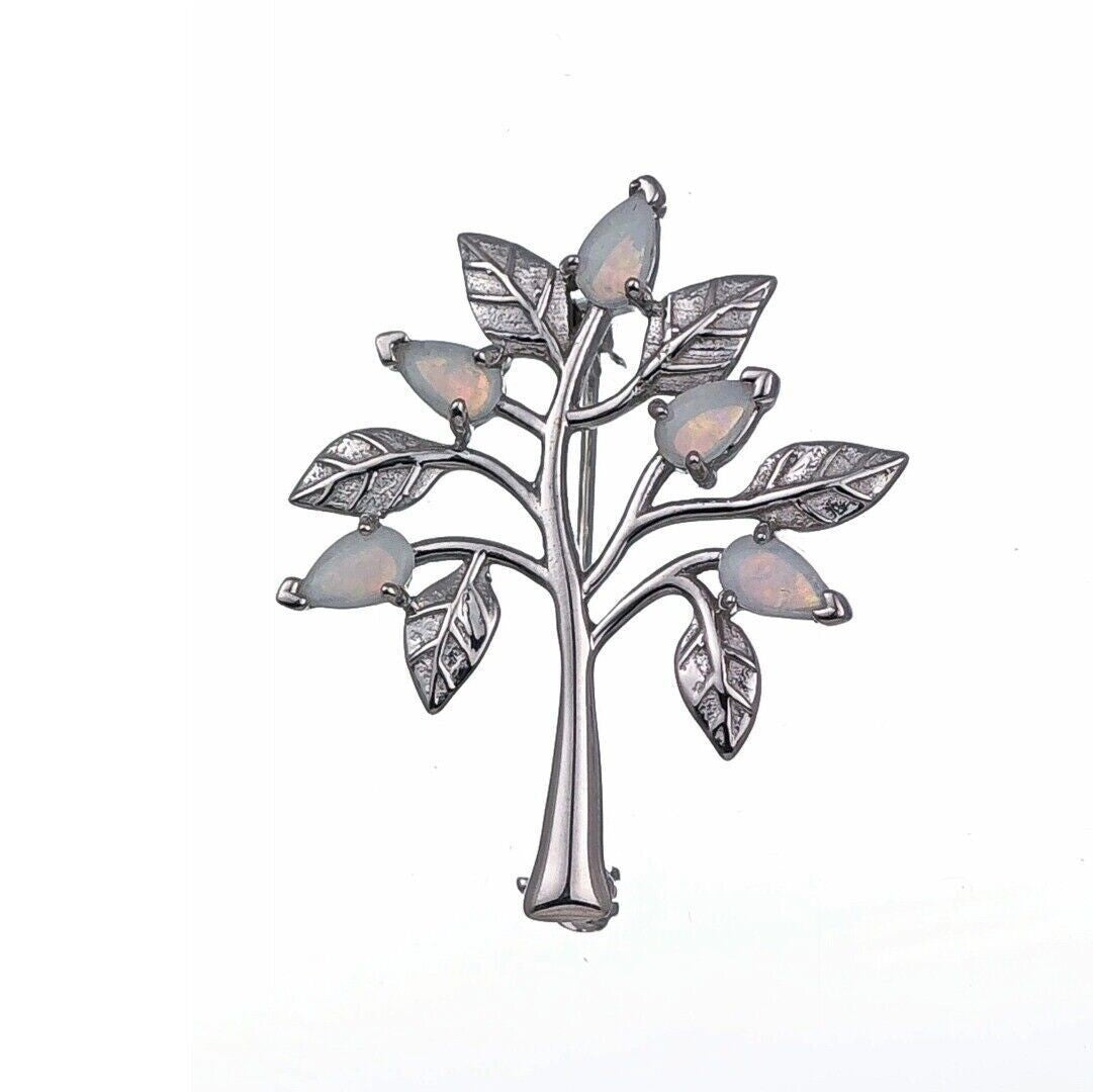 elegant tree of life brooch with natural australian white opal designed in the UK