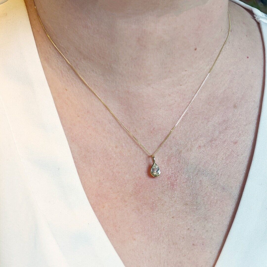 White Topaz Set Pendant and Earrings 9ct Yellow Gold Infinity Loop