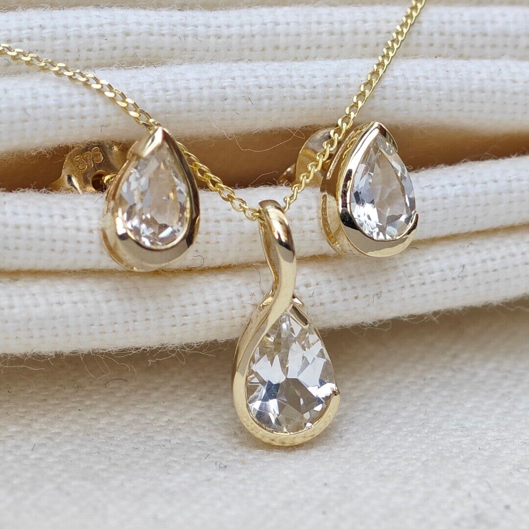 White Topaz Set Pendant and Earrings 9ct Yellow Gold Infinity Loop