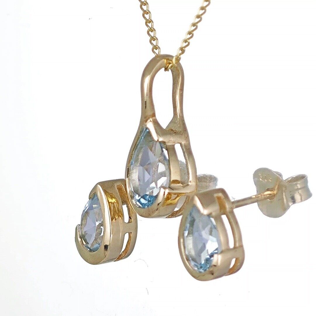 Blue Topaz Infinity Loop Jewellery Set in 9ct Gold