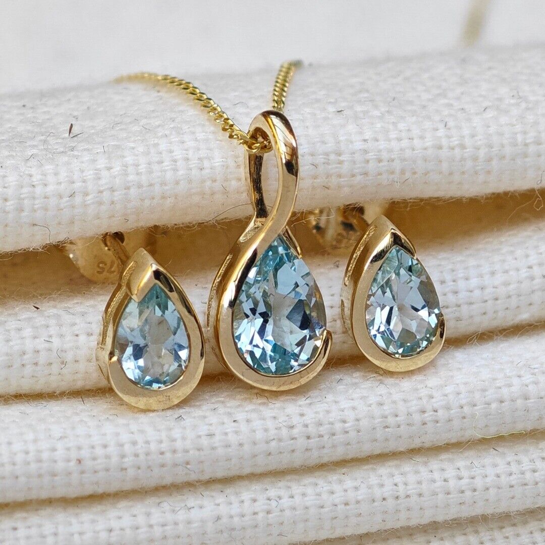 Blue Topaz Infinity Loop Jewellery Set in 9ct Gold