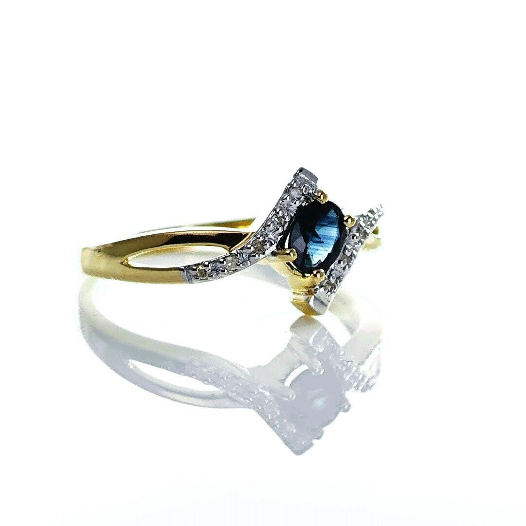 9ct Sapphire Ring Size O.5 Diamond Yellow Gold 0.4ct Blue Oval Gemstone