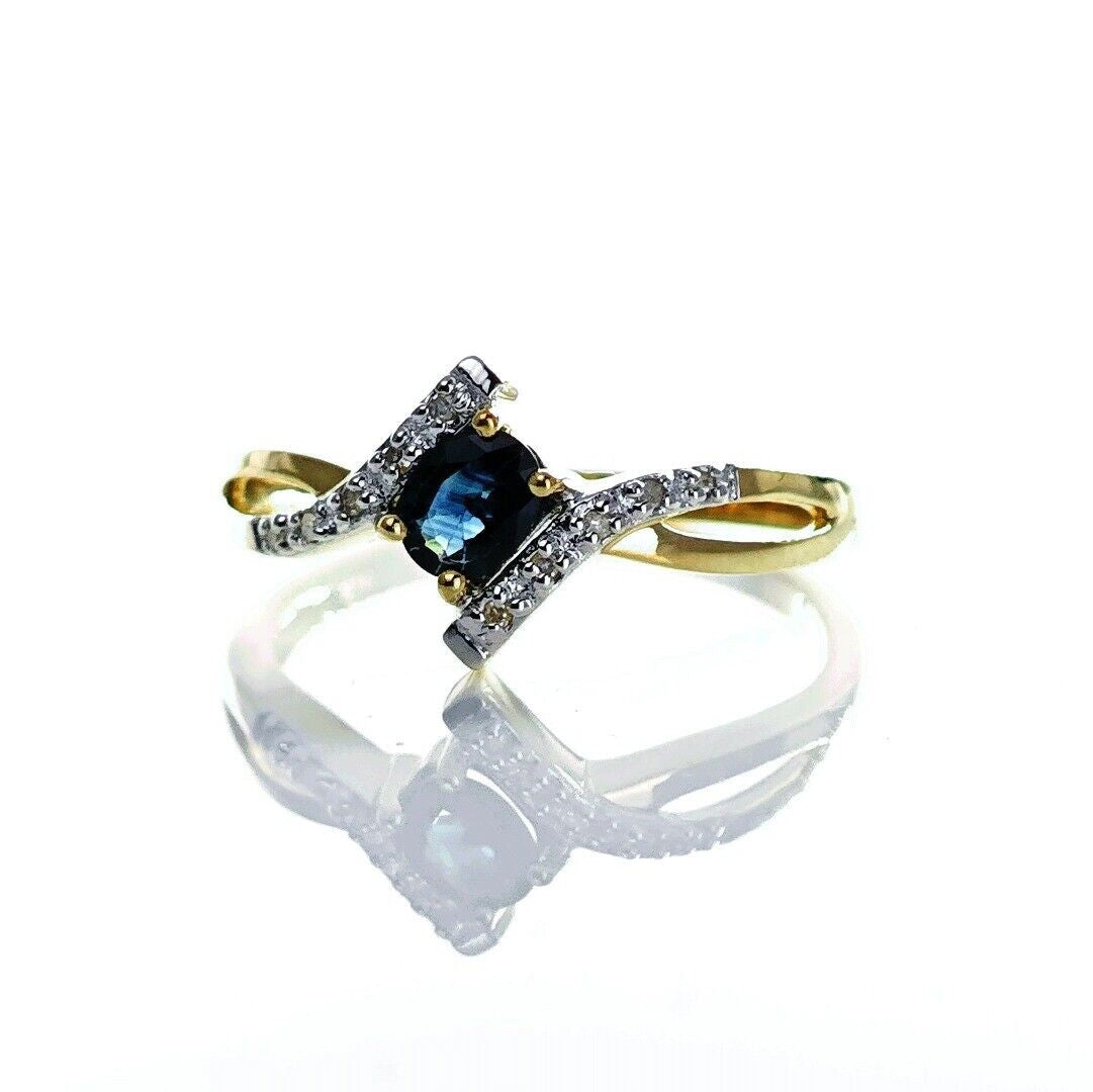9ct Sapphire Ring Size O.5 Diamond Yellow Gold 0.4ct Blue Oval Gemstone