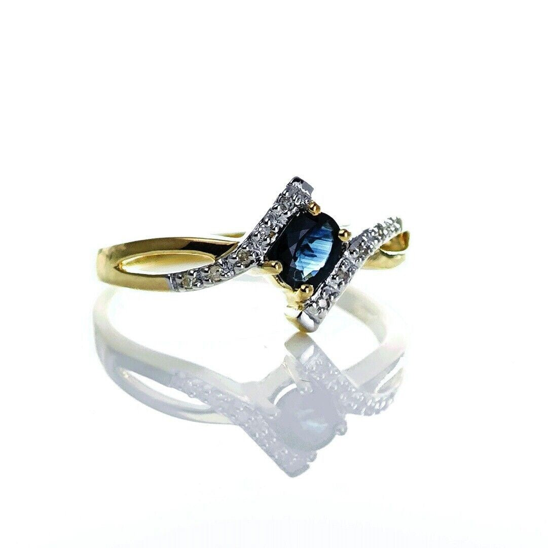 9ct Sapphire Ring Size O.5 Diamond Yellow Gold 0.4ct Blue Oval Gemstone