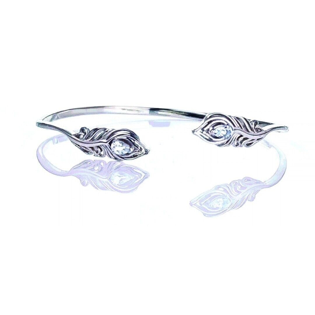 aquamarine bangle sterling silver natural blue gemstones peacock feather hallmark designed in the UK
