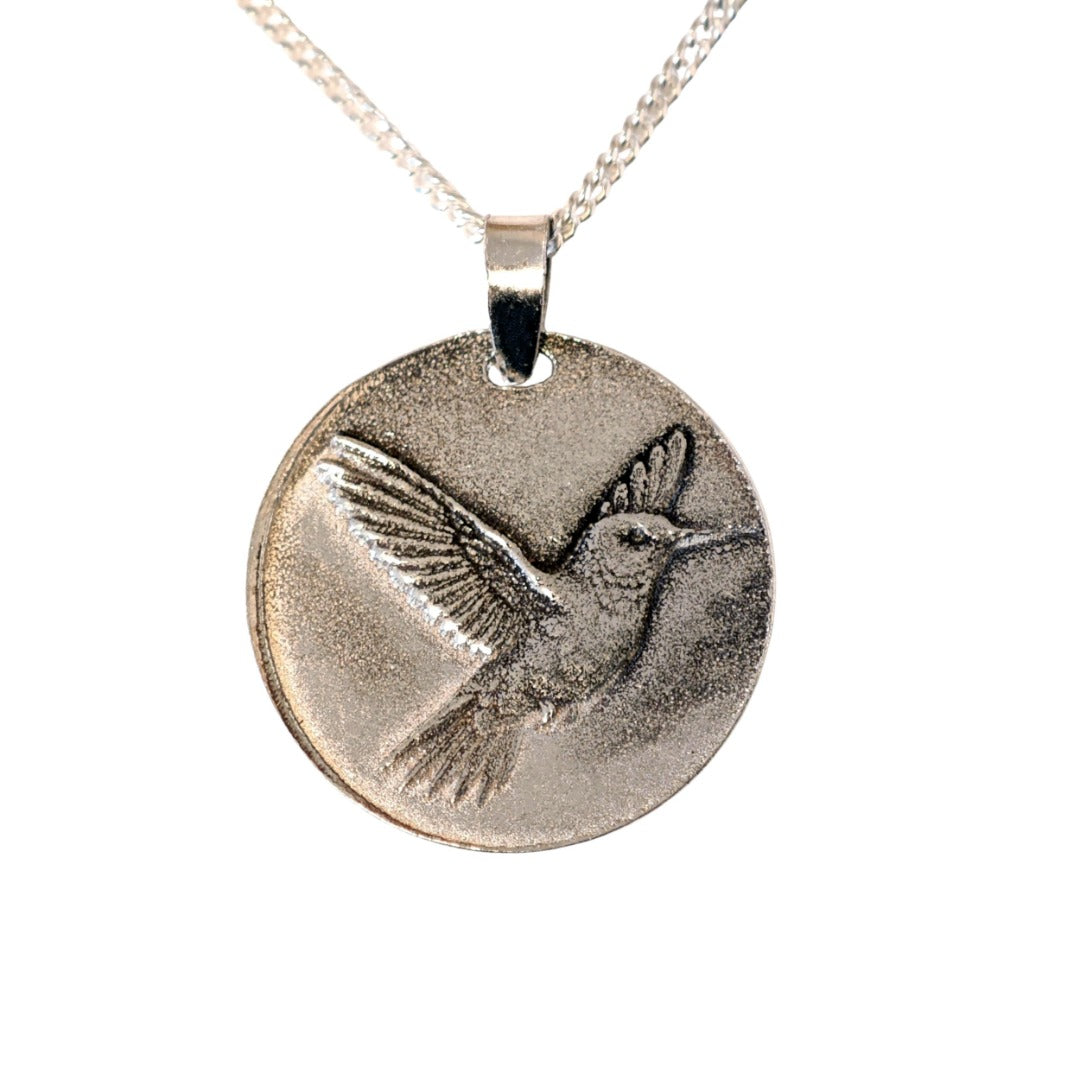 Hummingbird deep engraved sterling silver pendant on curb chain