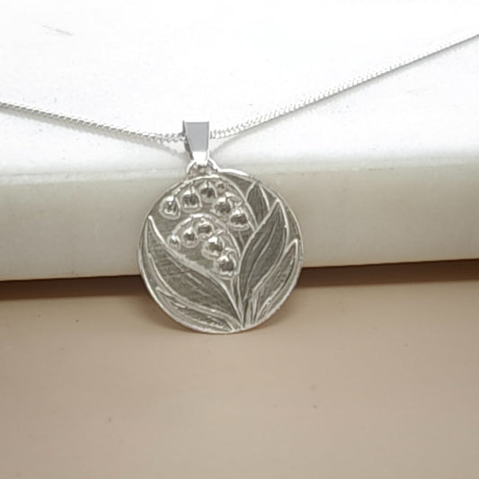 Lily of the Valley Engraved Sterling Silver Coin Necklace