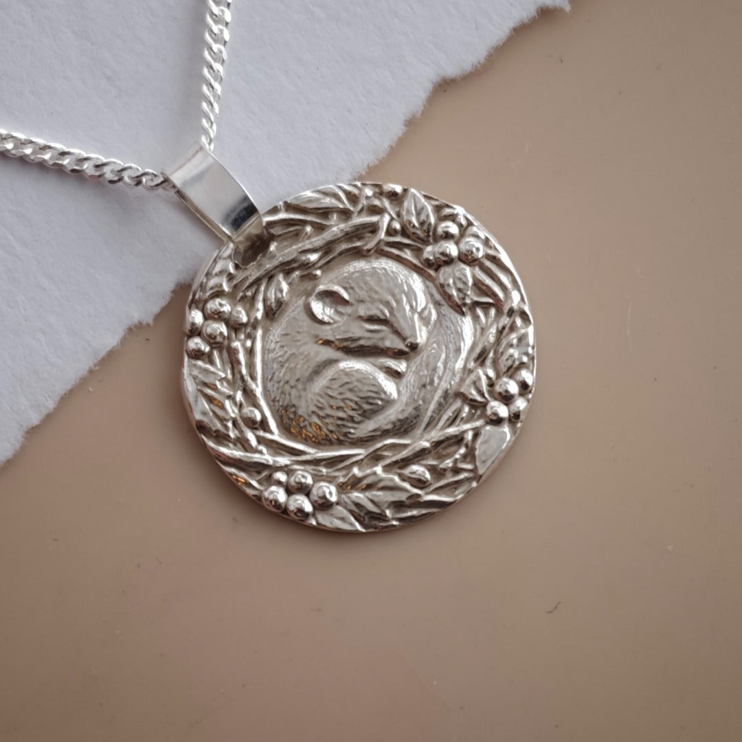 Dormouse curled in a winter nest engraved coin pendant necklace in recycled sterling silver, Ojewellery Christmas jewellery