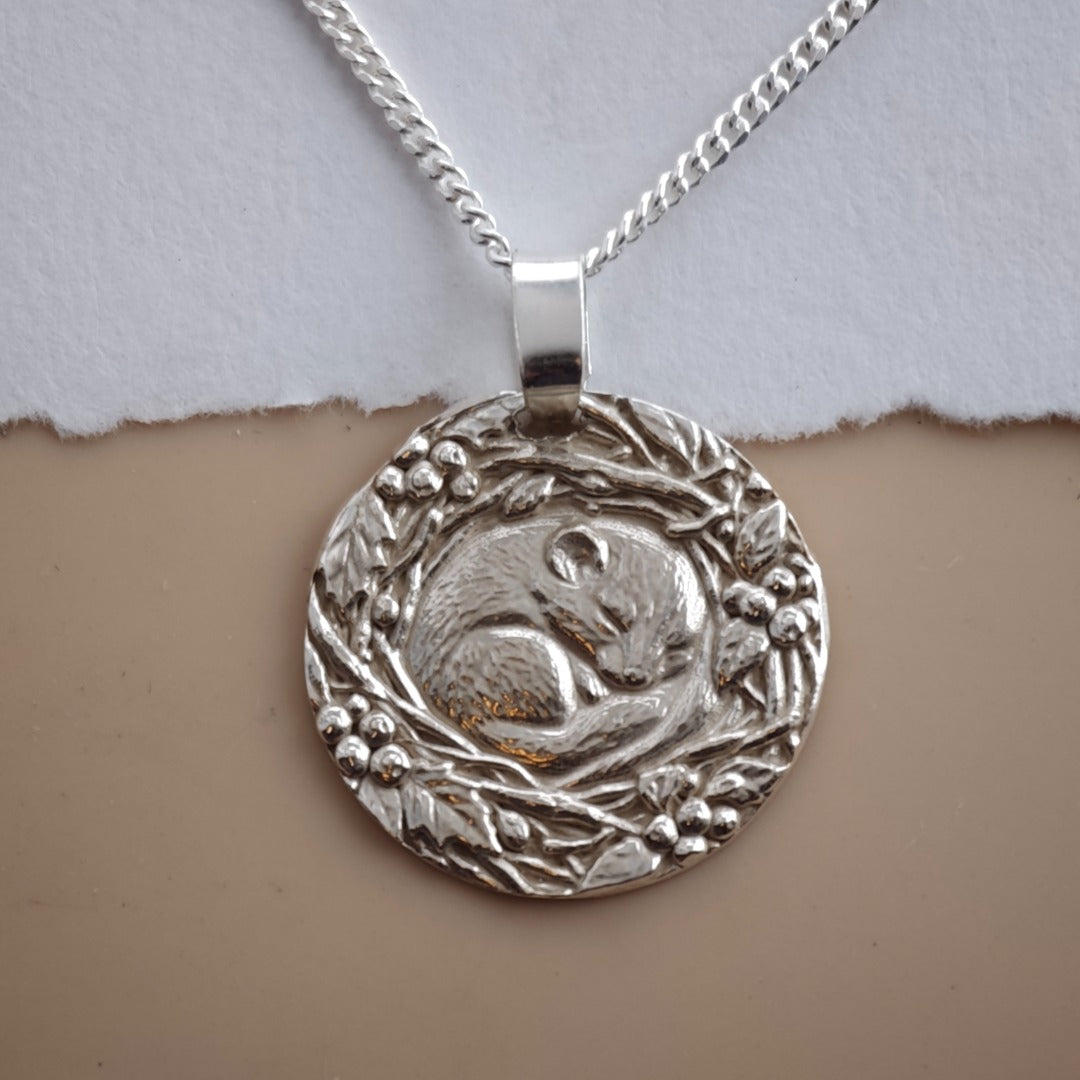 Dormouse curled in a winter nest engraved coin pendant necklace in recycled sterling silver, Ojewellery Christmas jewellery