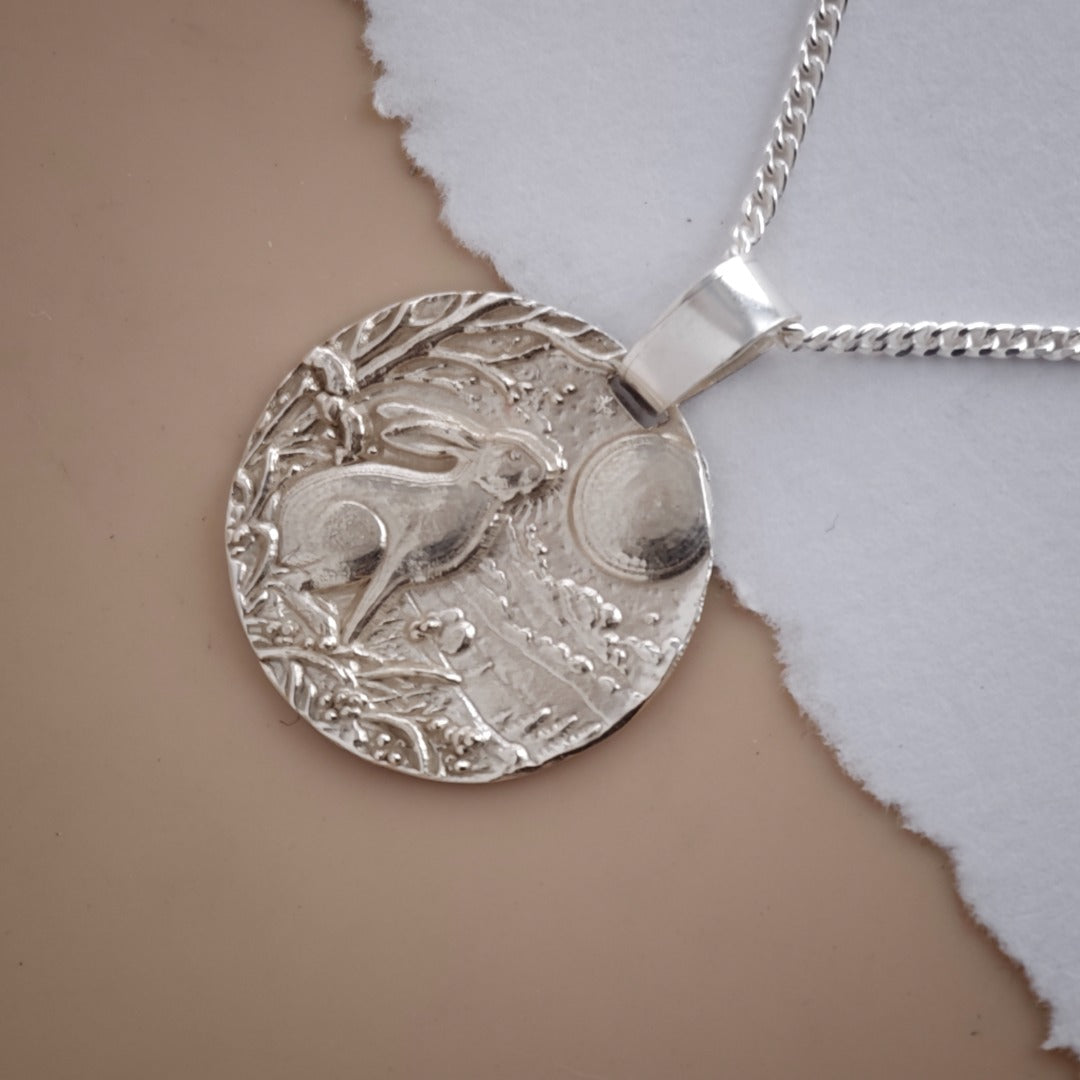 Moongazing hare engraved coin pendant necklace in recycled sterling silver, Ojewellery Christmas jewellery