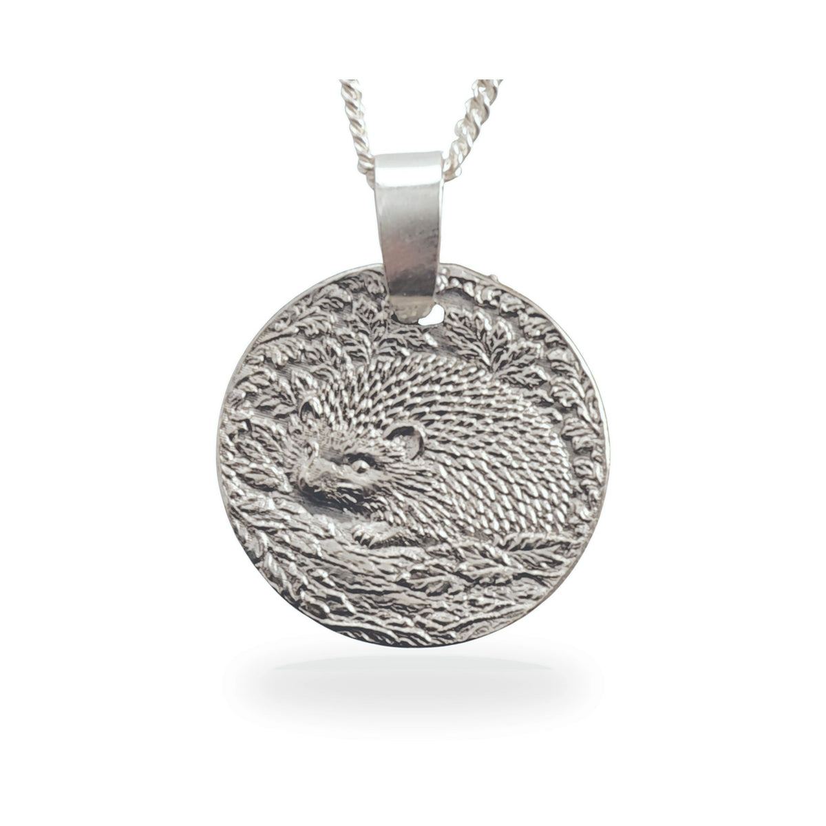Sterling silver engraved hedgehog coin pendant necklace, handcrafted in the UK from recycled sterling silver