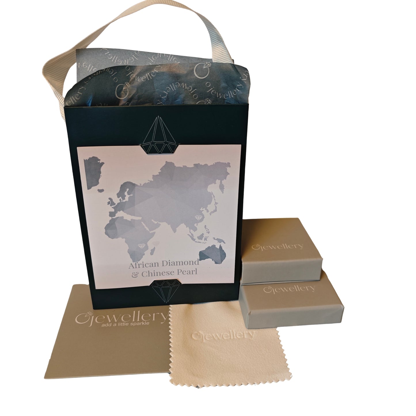 Jewelry packaging set with world map design showing pearl and diamond mined location, jewelry boxes, and cleaning cloth on a white background.