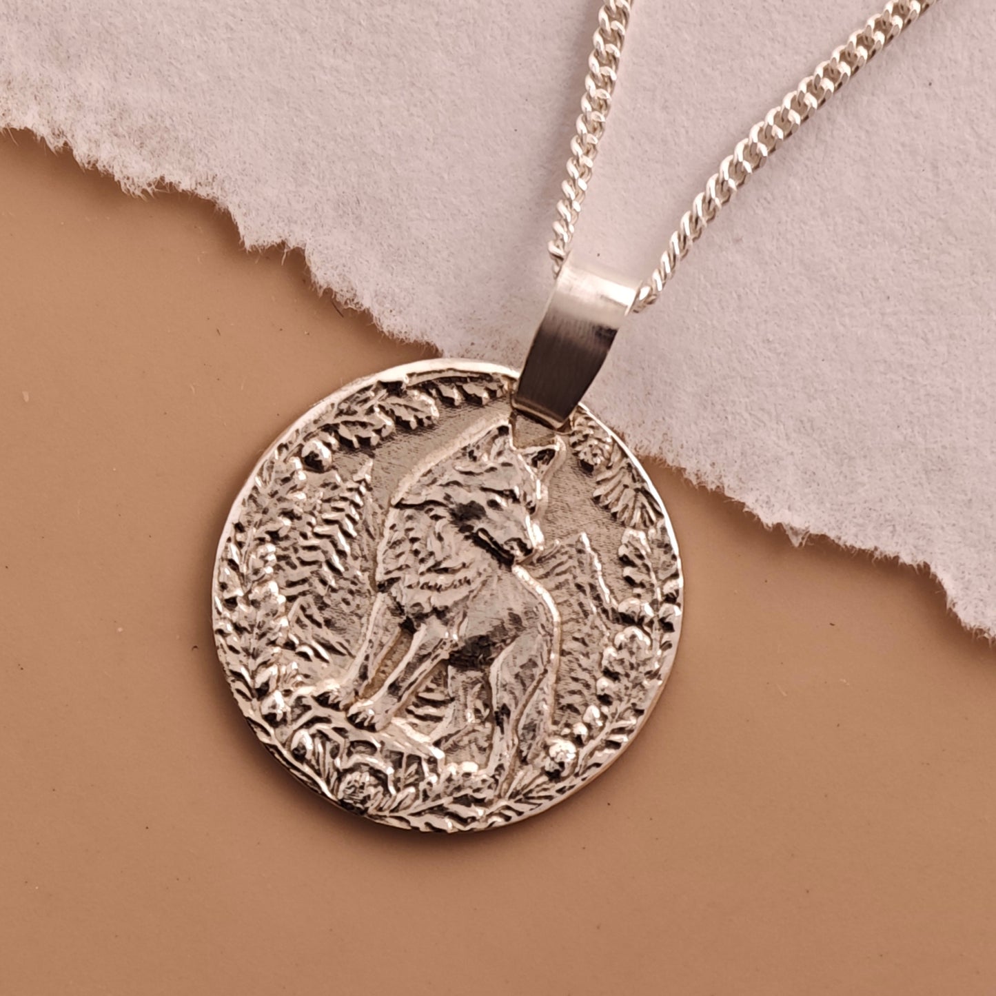 Wolf Engraved Sterling Silver Coin Necklace