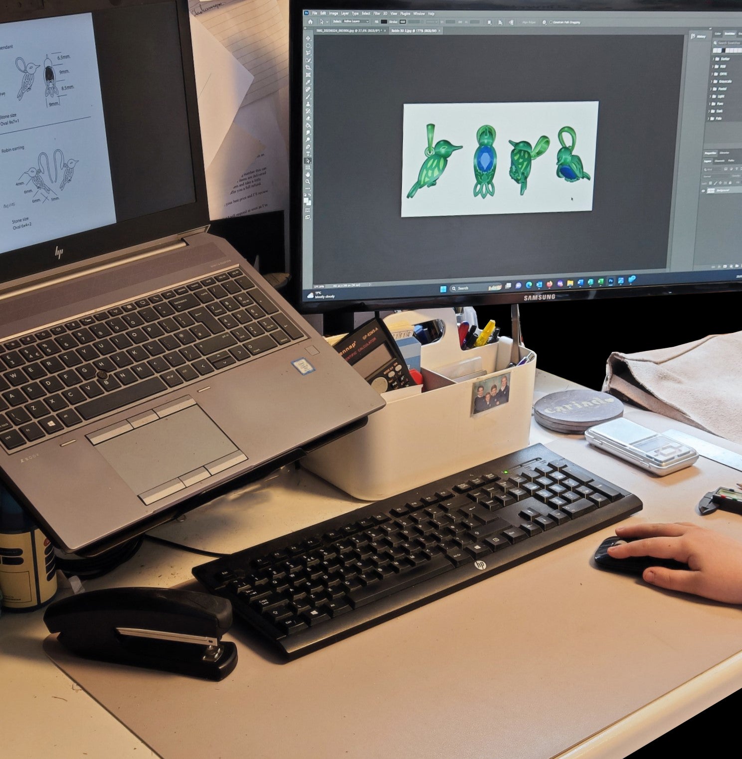 Robin pendant shown as 3D model on laptop