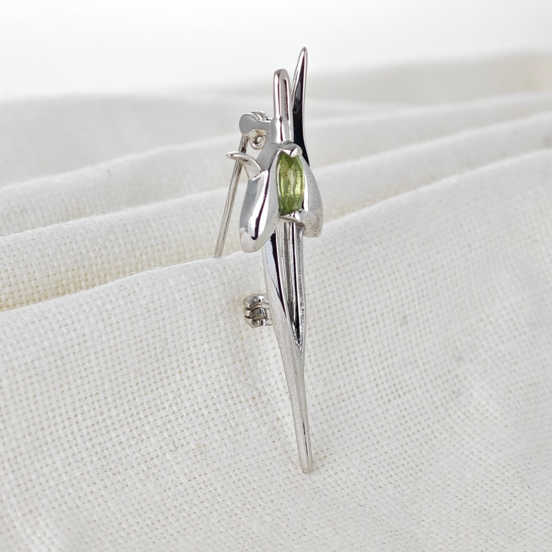 Peridot Snowdrop Brooch Sterling Silver on cotton