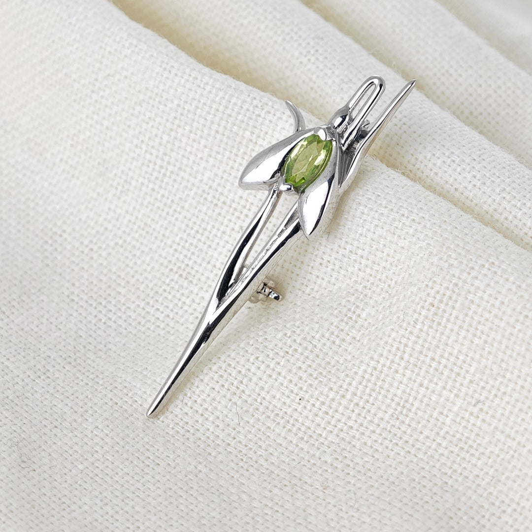 Peridot Snowdrop Brooch Sterling Silver on cotton