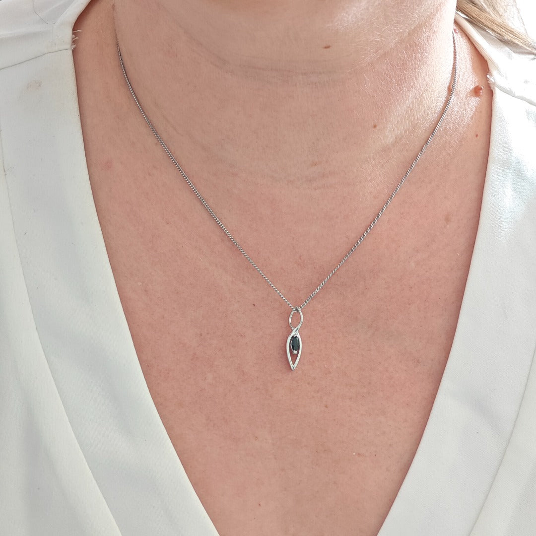 Australian Inky Blue Natural Sapphire Pendant made of Sterling Silver on model