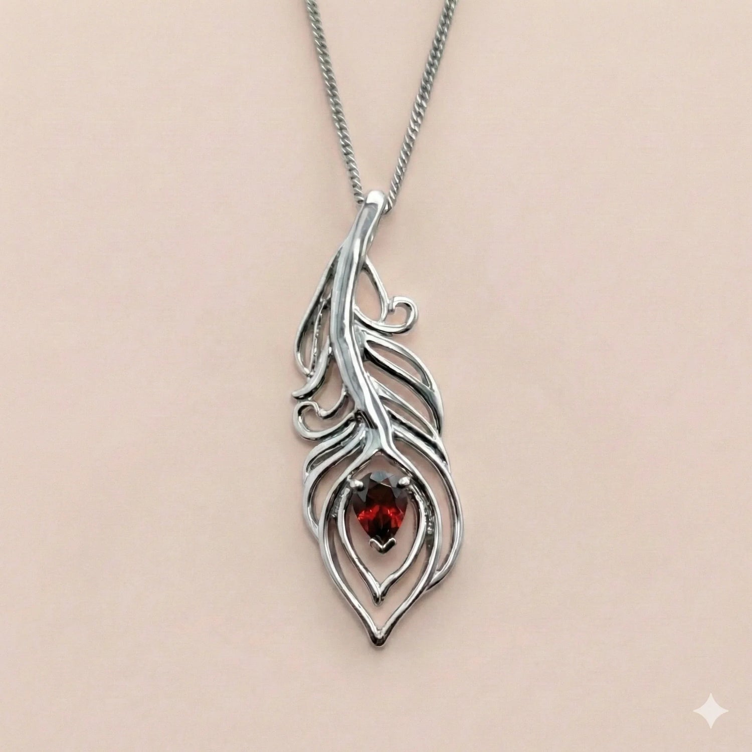 Garnet Set Peacock Feather Pendant Necklace in Sterling Silver