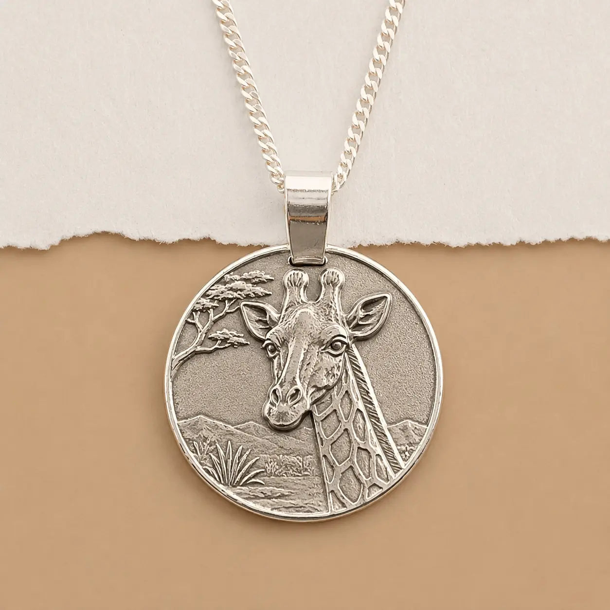 Giraffe engraved sterling silver coin pendant necklace, part of the Ojewellery safari and exotic jewellery collection