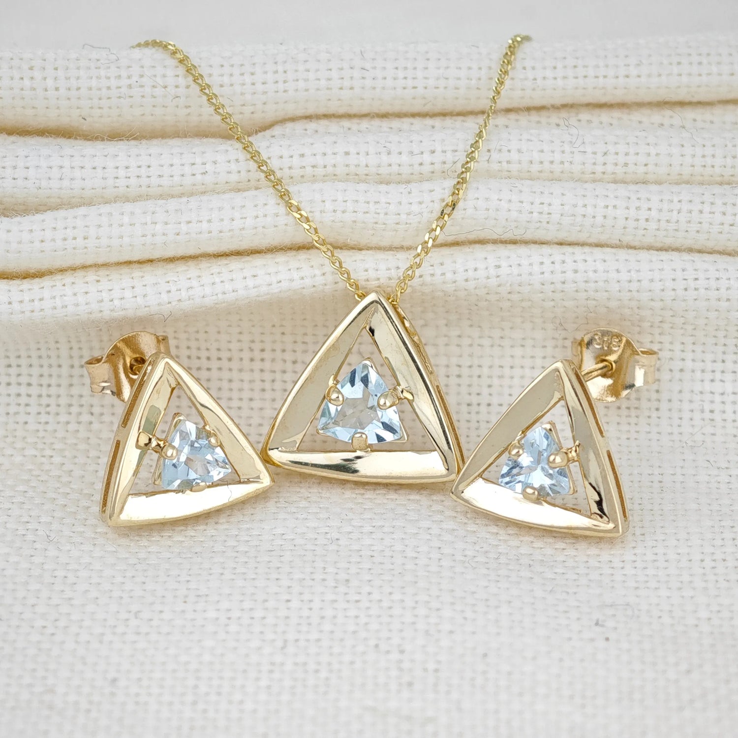 Aquamarine jewellery – necklaces, earrings, sets  – designed in the UK