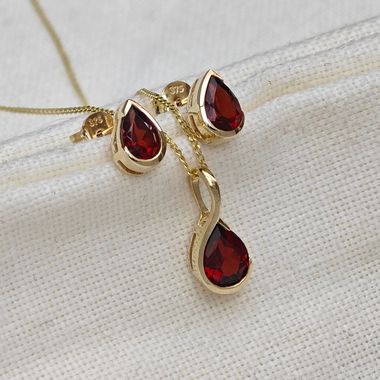 9ct Yellow Gold Garnet jewellery – necklaces, rings, earrings – designed in the UK