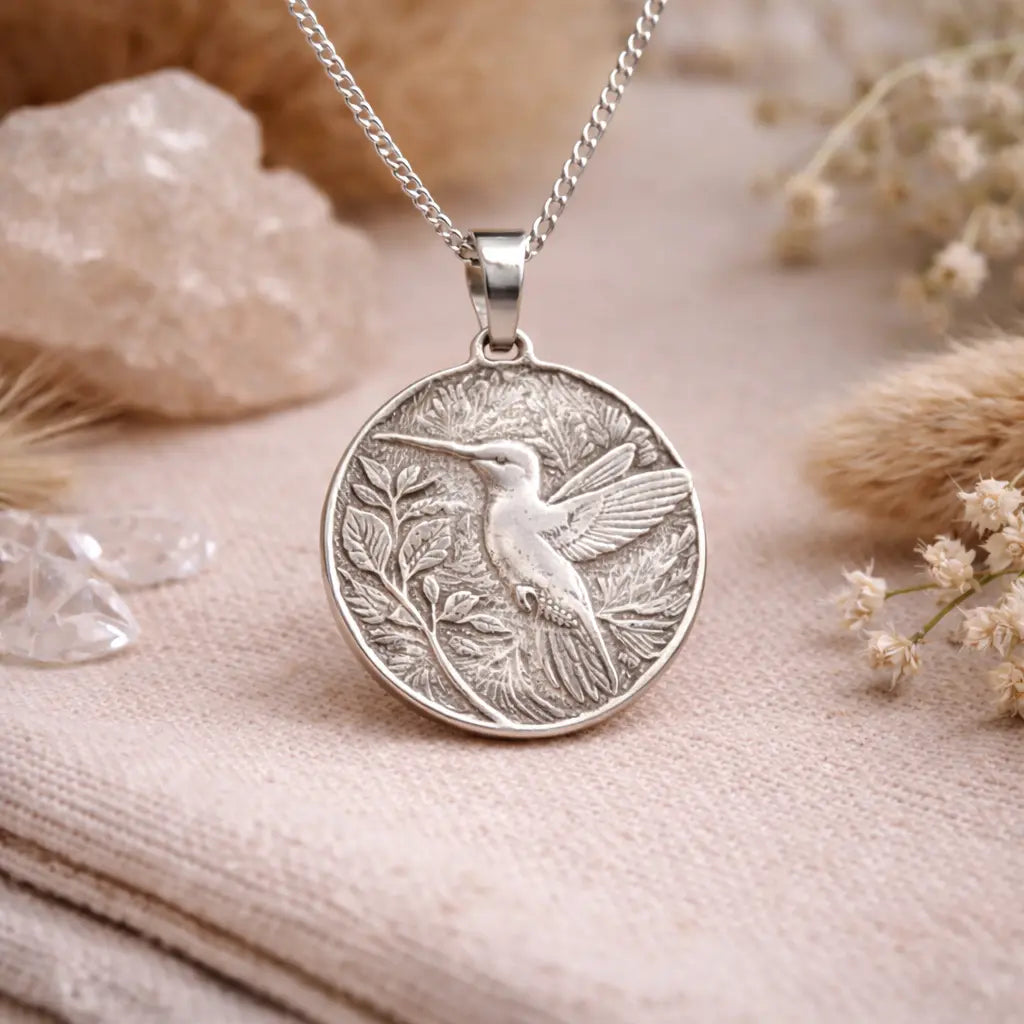 Hummingbird pendant on natural backdrop