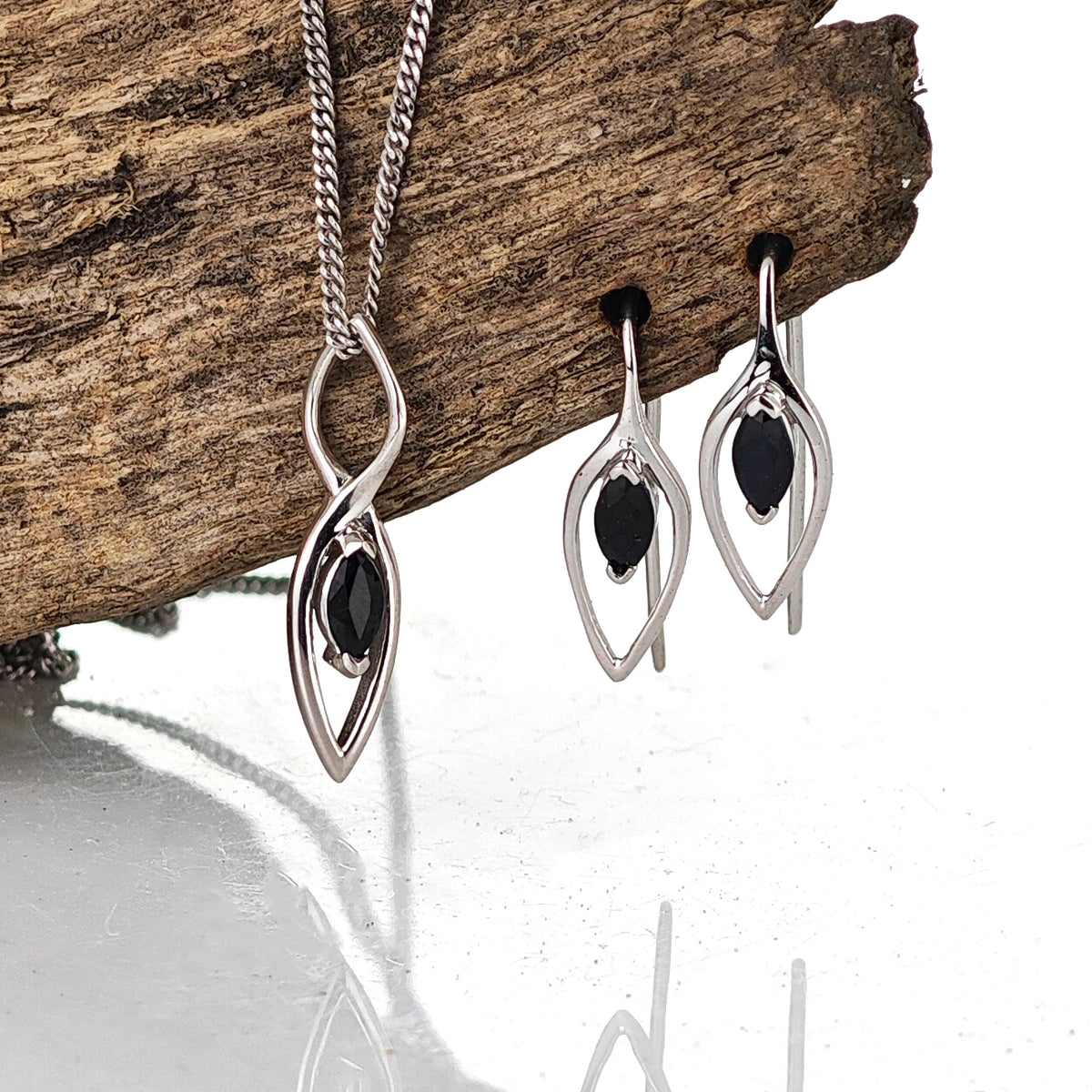 Sapphire Necklace Earring Set on drift wood
