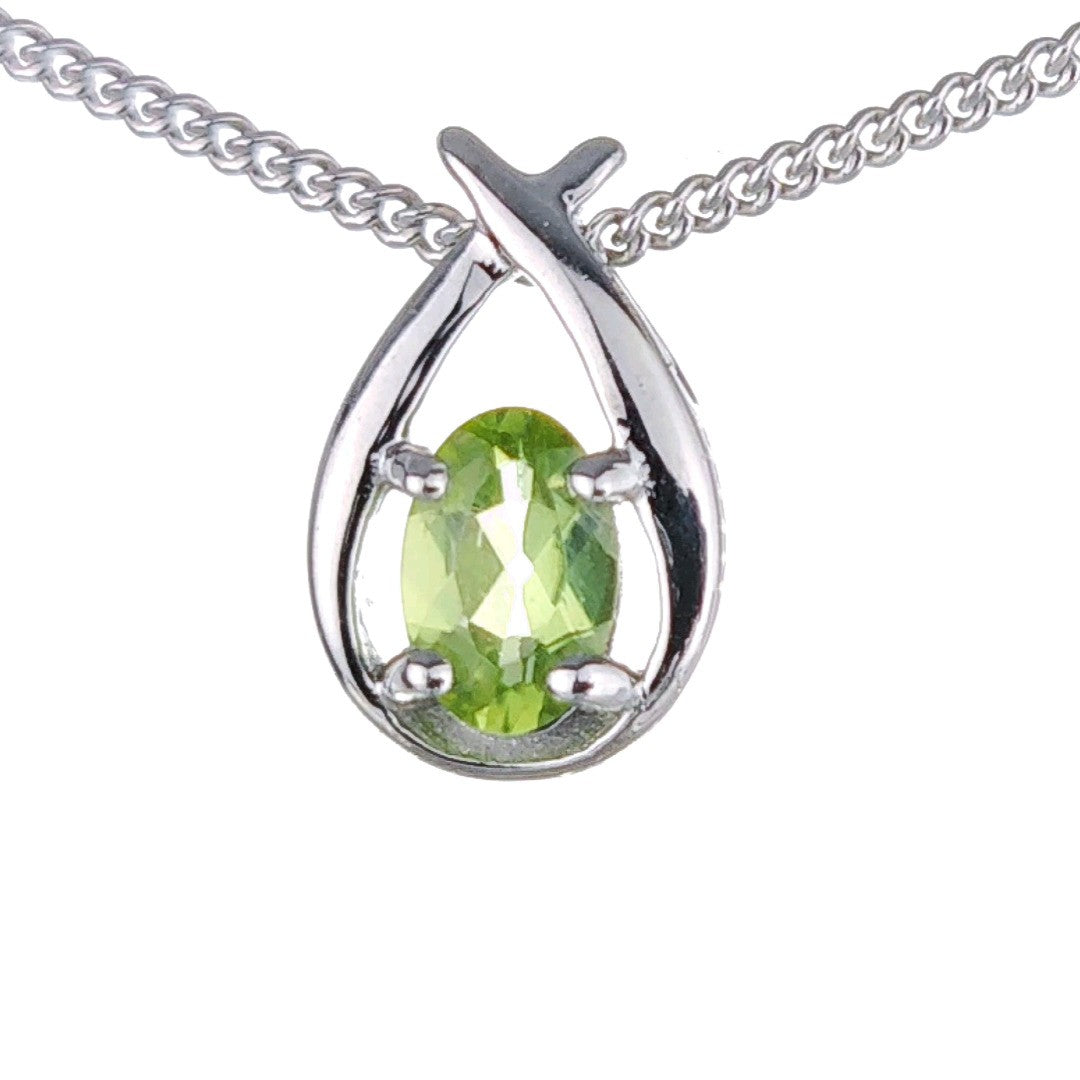 peridot necklace 0.5ct pear green twist pendant designed in the UK