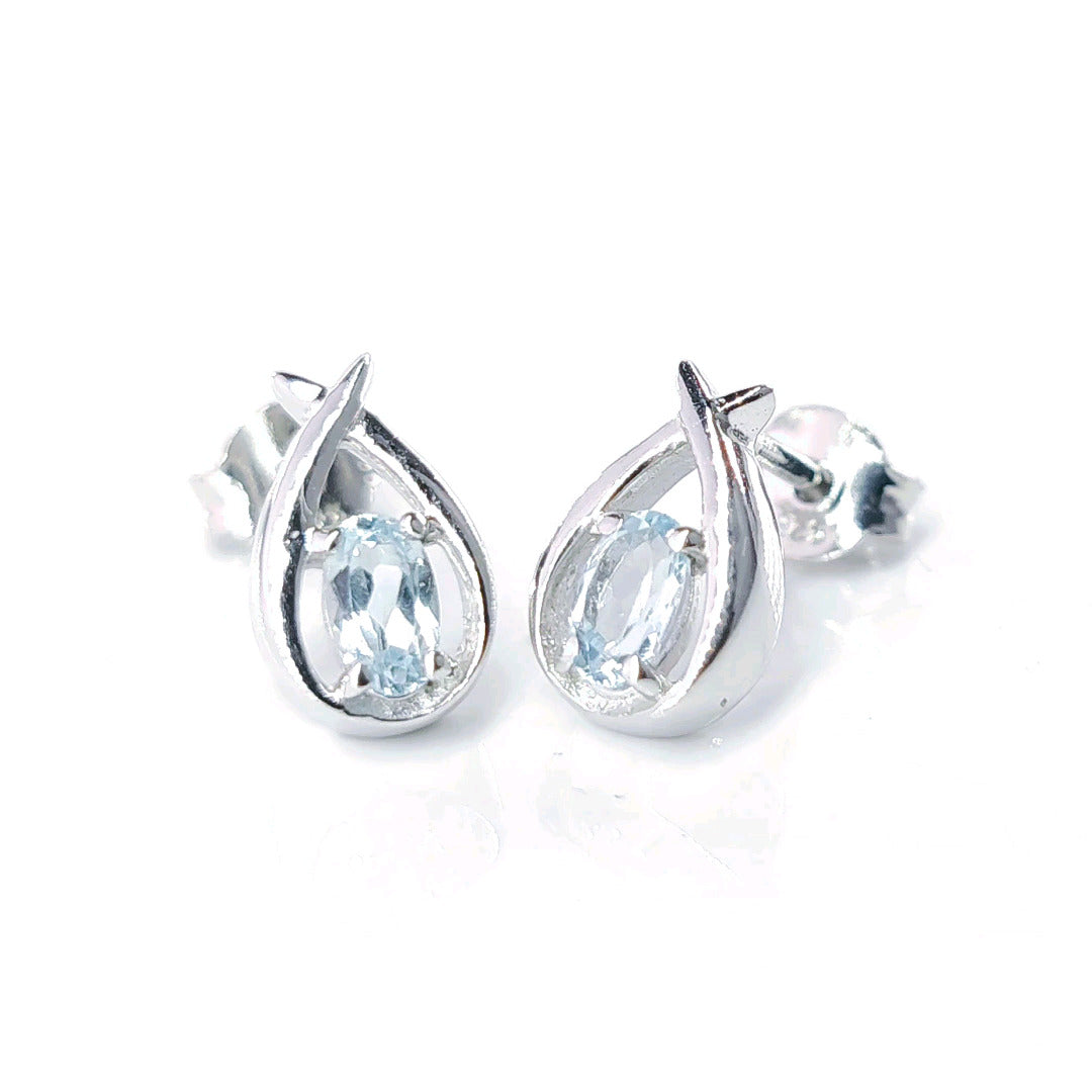 topaz earrings 0.5ct pear blue twist studs silver december birthstone designed in the UK