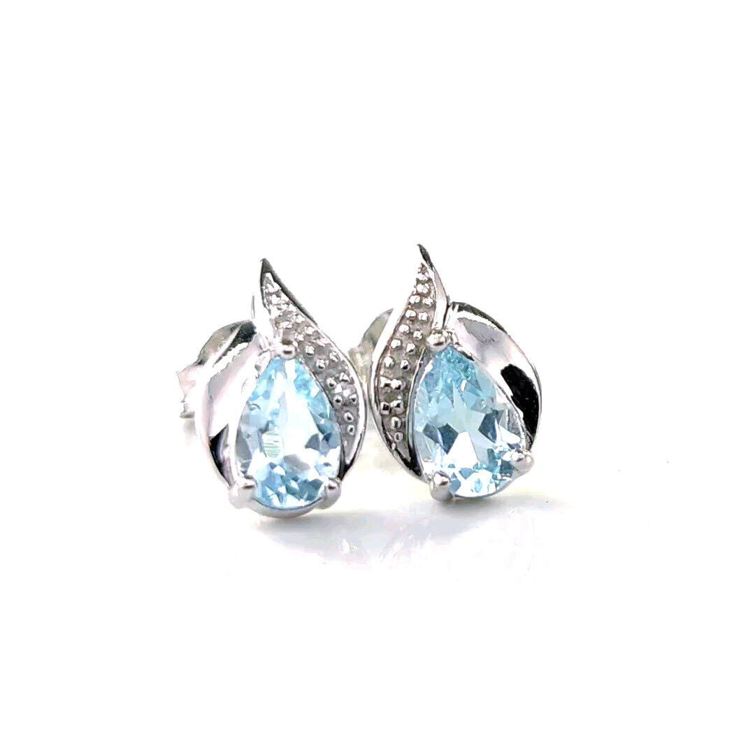 topaz earrings diamond 1ct pear studs sterling silver december birthstone designed in the UK