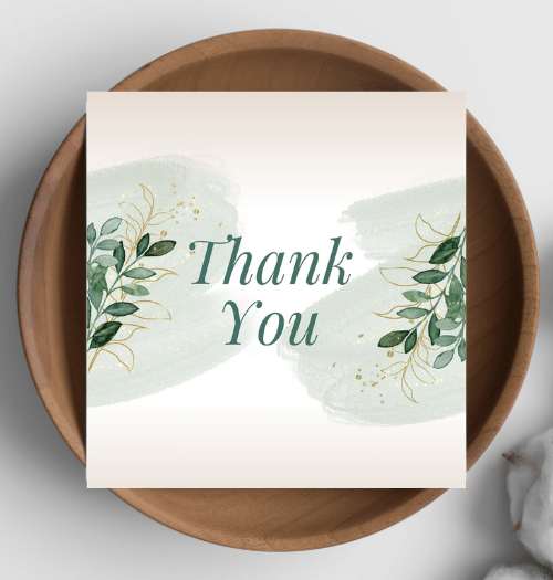 Card with 'Thank You' text on a decorative plate
