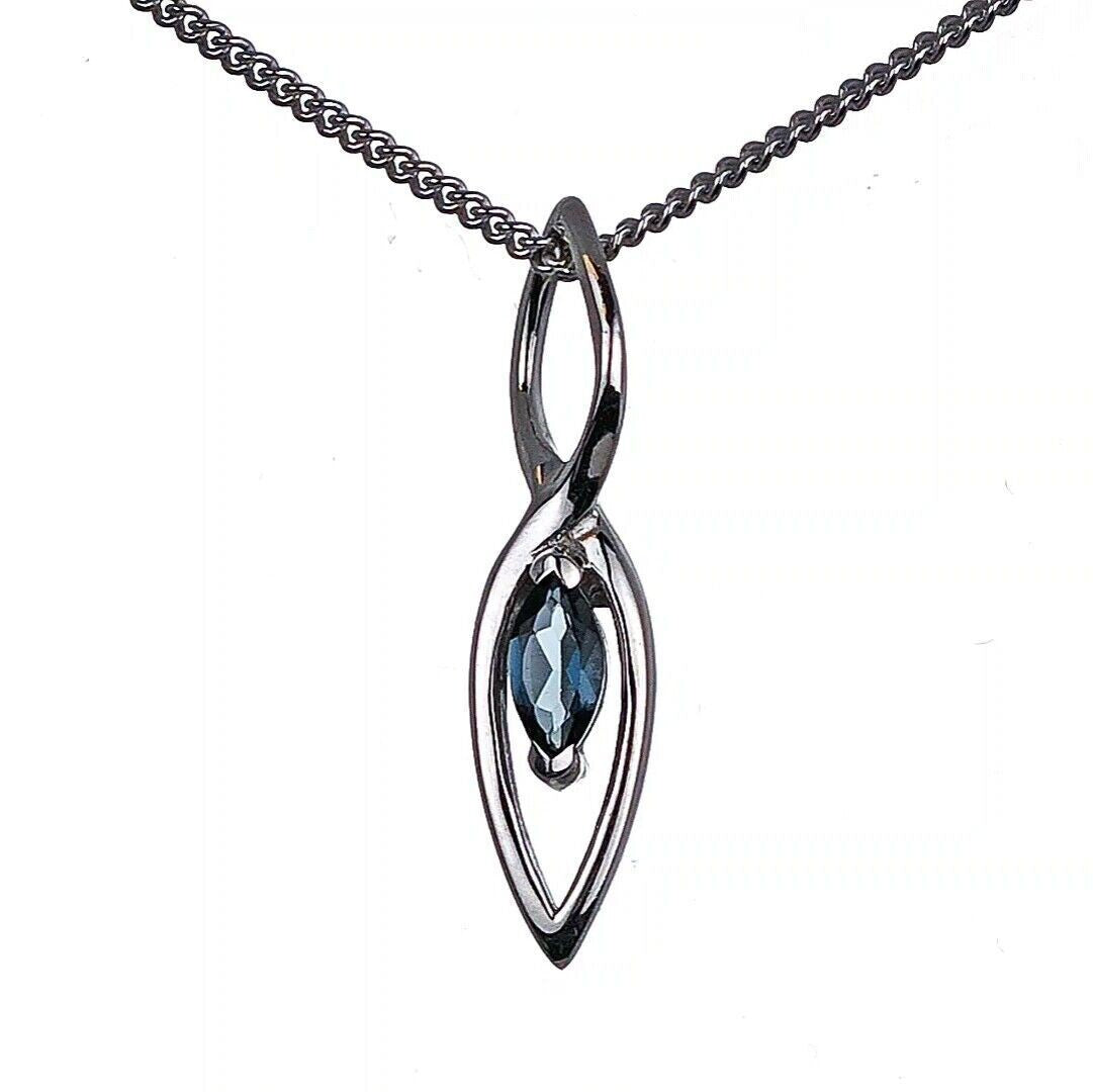 london blue topaz pendant sterling silver marquise infinity loop designed in the UK