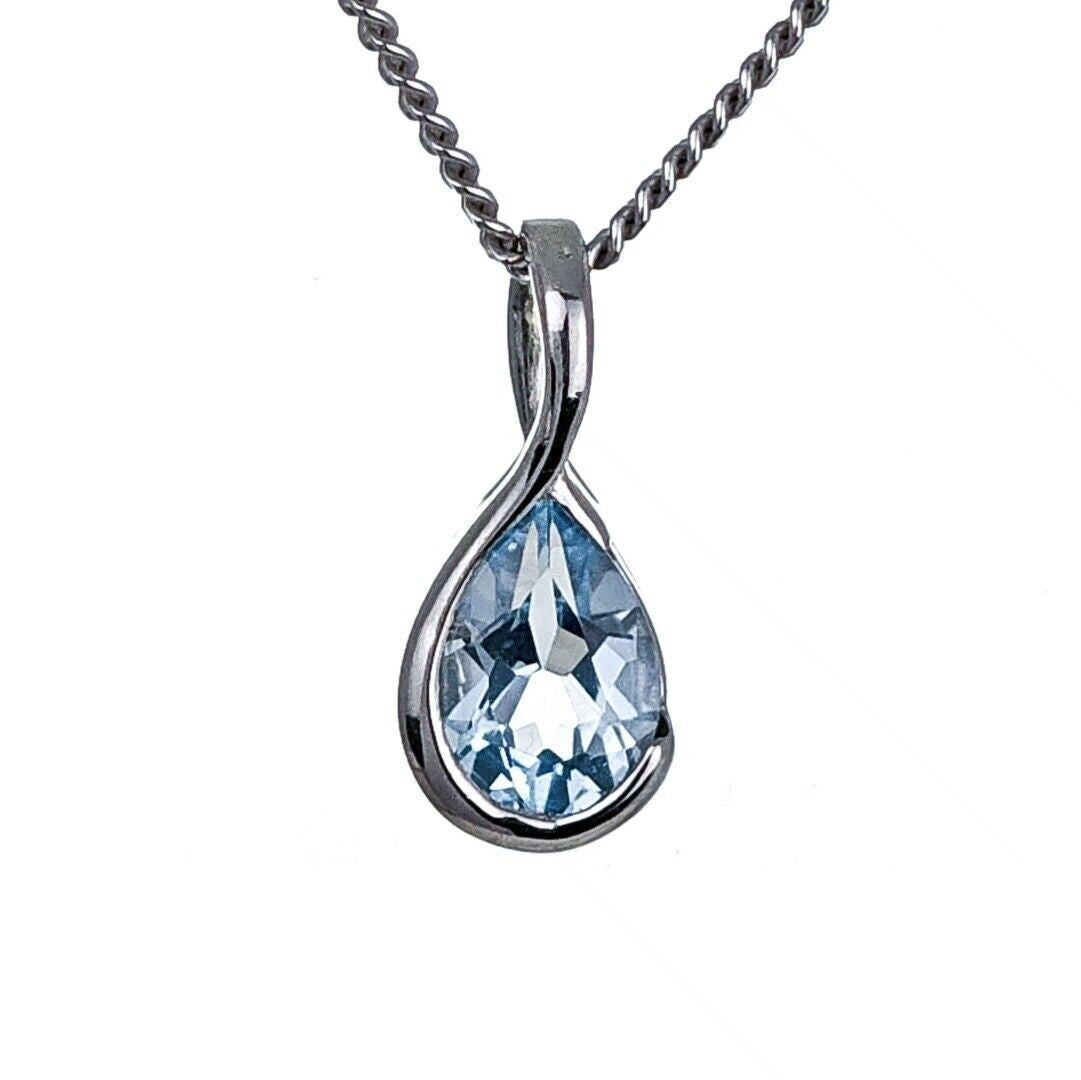 Blue Topaz Pendant Sterling Silver Infinity Loop