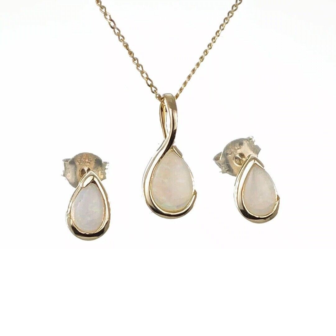 elegant 9ct gold opal necklace and stud earrings set designed in the UK