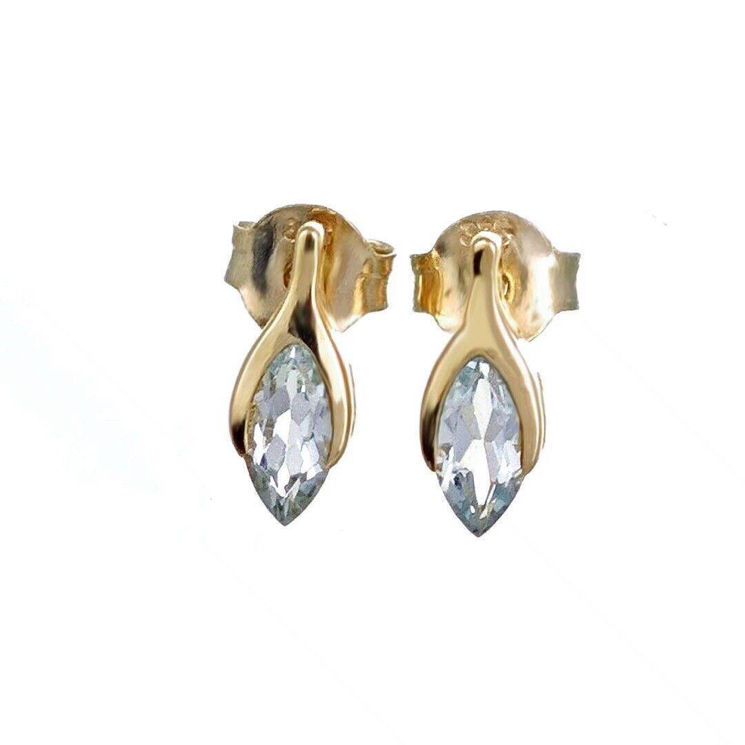 9ct gold aquamarine earrings minimalist marquise blue gemstone studs designed in the UK