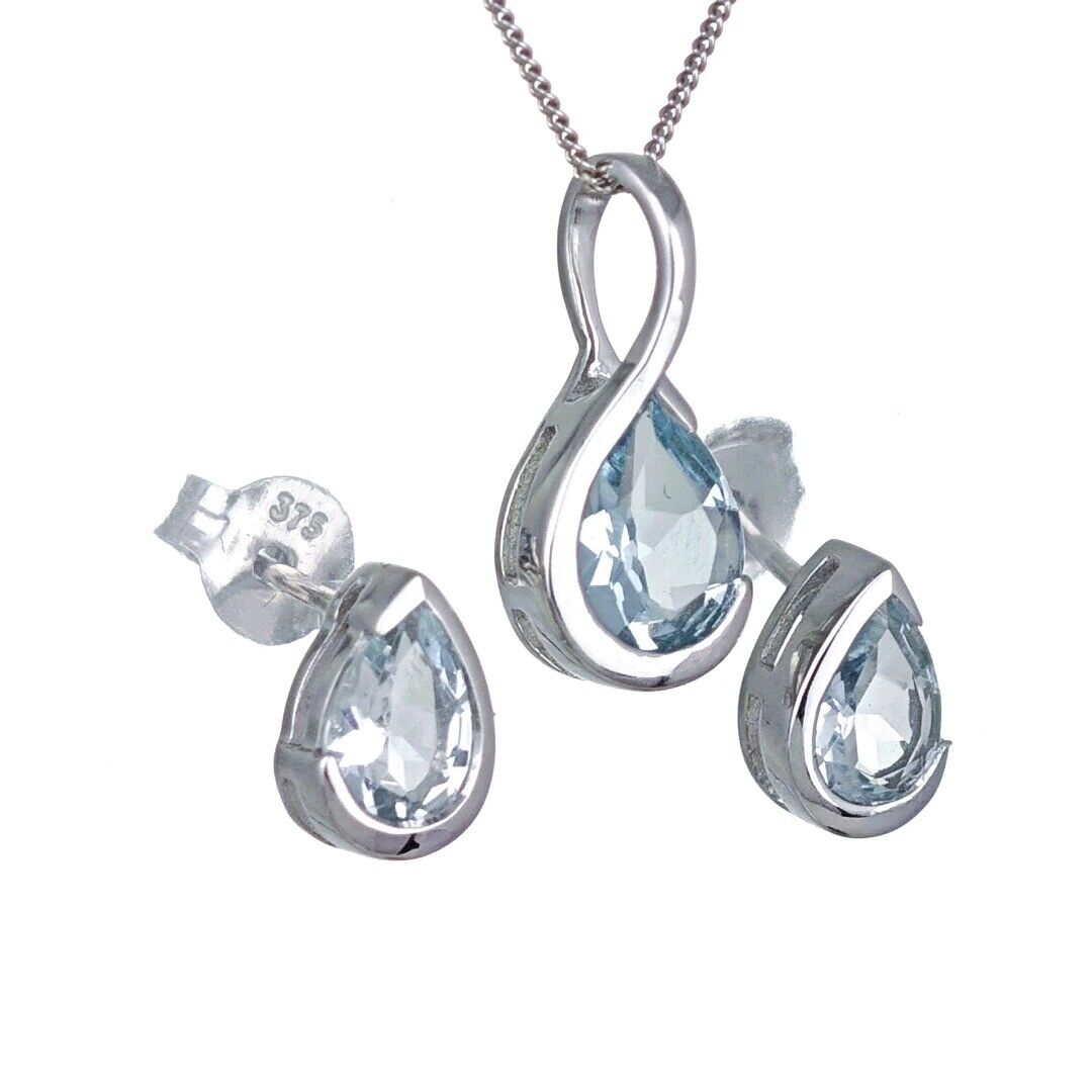 9ct White Gold Aquamarine Set Pendant Earring Infinity Loop