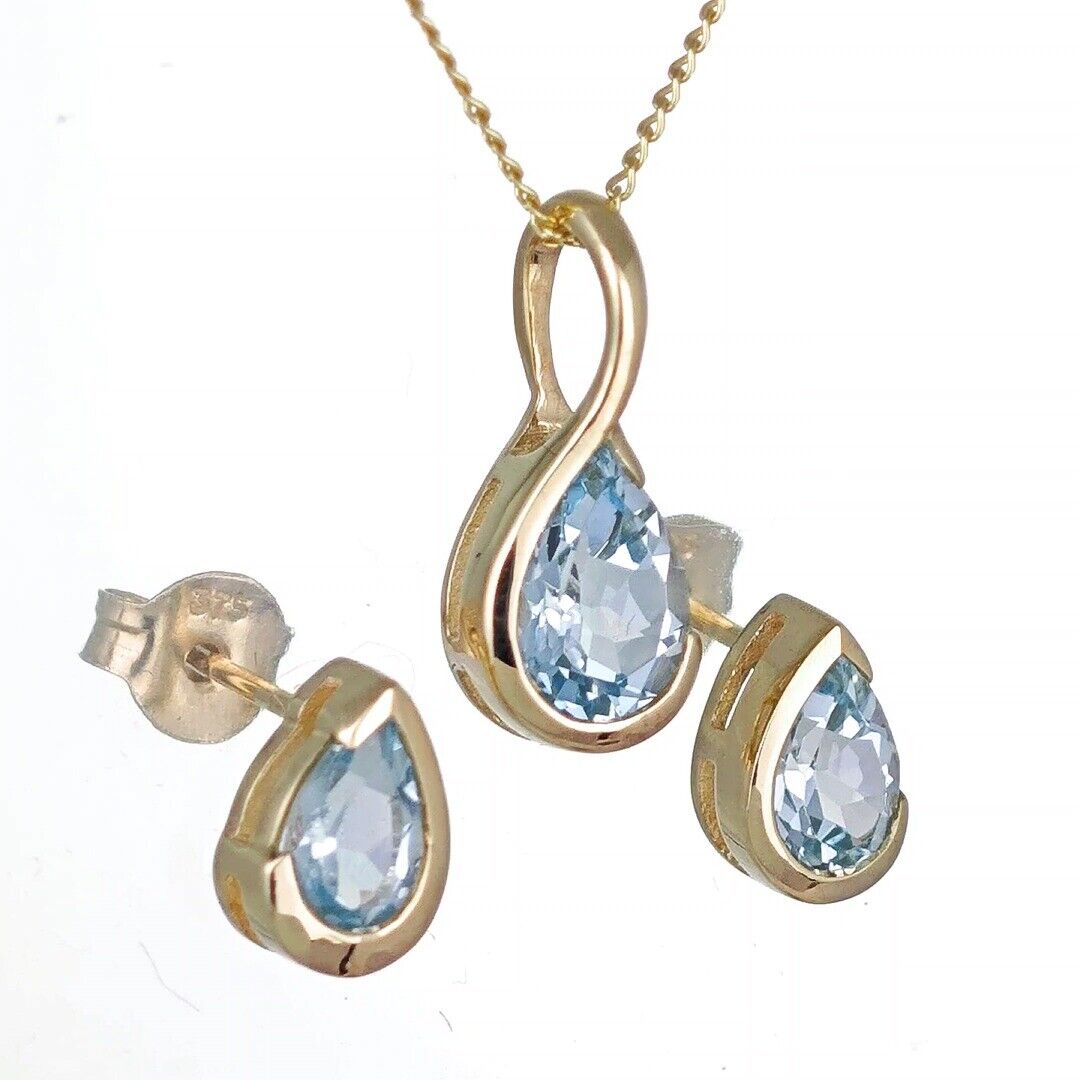 Blue Topaz Infinity Loop Jewellery Set in 9ct Gold