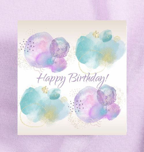 Birthday card with watercolor balloons and 'Happy Birthday!' text on a light purple background