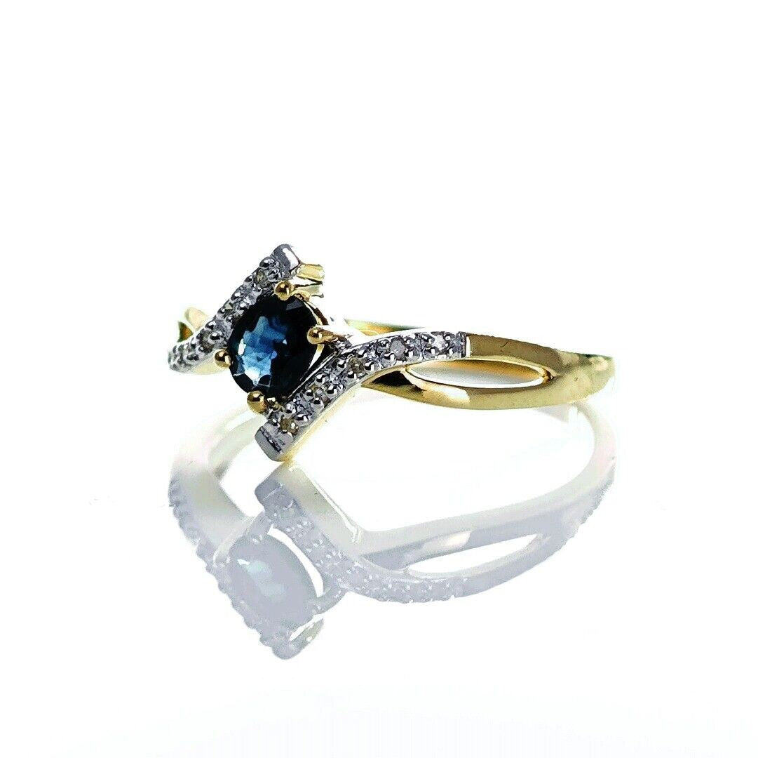 9ct Sapphire Ring Size O.5 Diamond Yellow Gold 0.4ct Blue Oval Gemstone