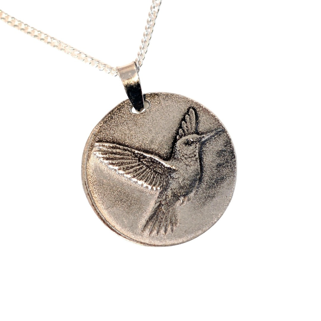 Hummingbird deep engraved sterling silver pendant on curb chain