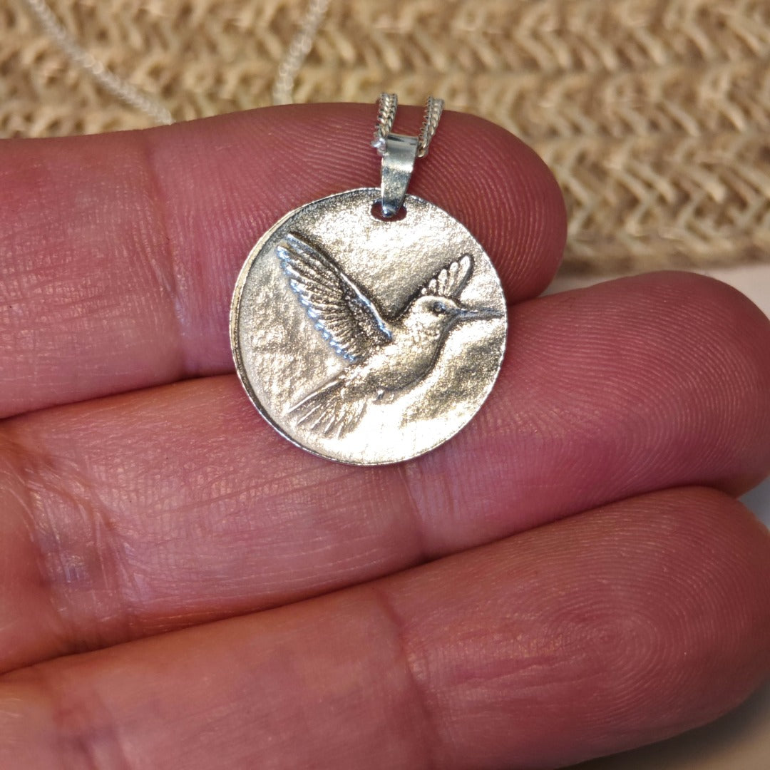 Hummingbird deep engraved sterling silver pendant on curb chain