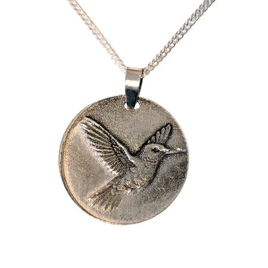 Hummingbird deep engraved sterling silver pendant on curb chain