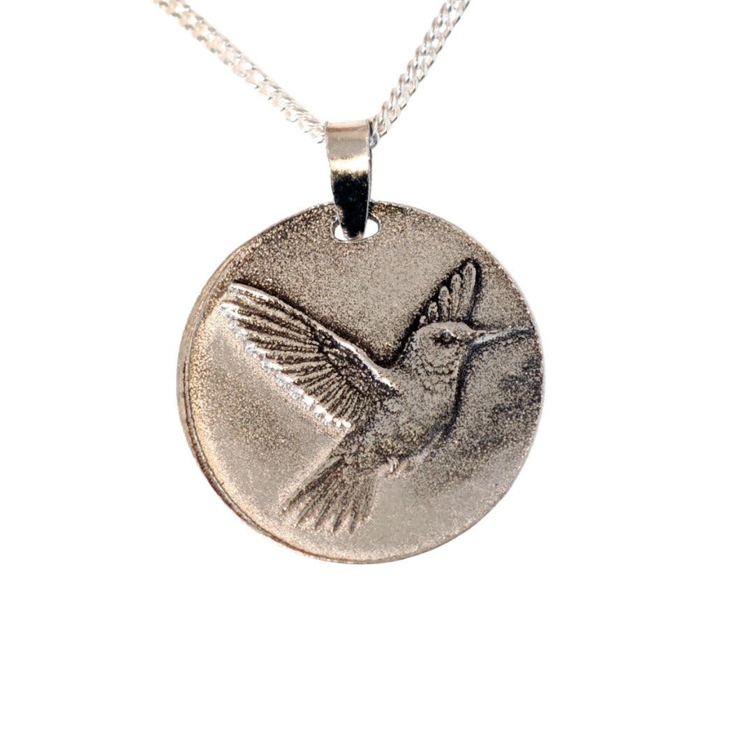 Hummingbird deep engraved sterling silver pendant on curb chain