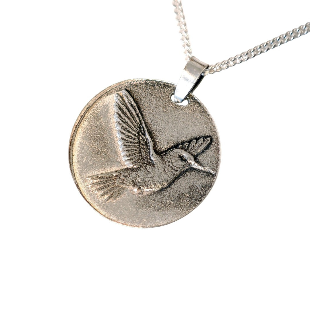 Hummingbird deep engraved sterling silver pendant on curb chain