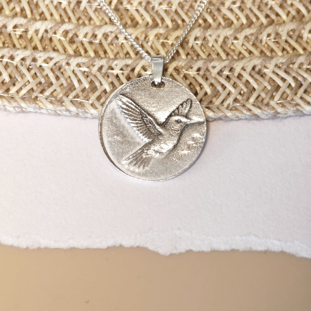 Hummingbird deep engraved sterling silver pendant on curb chain