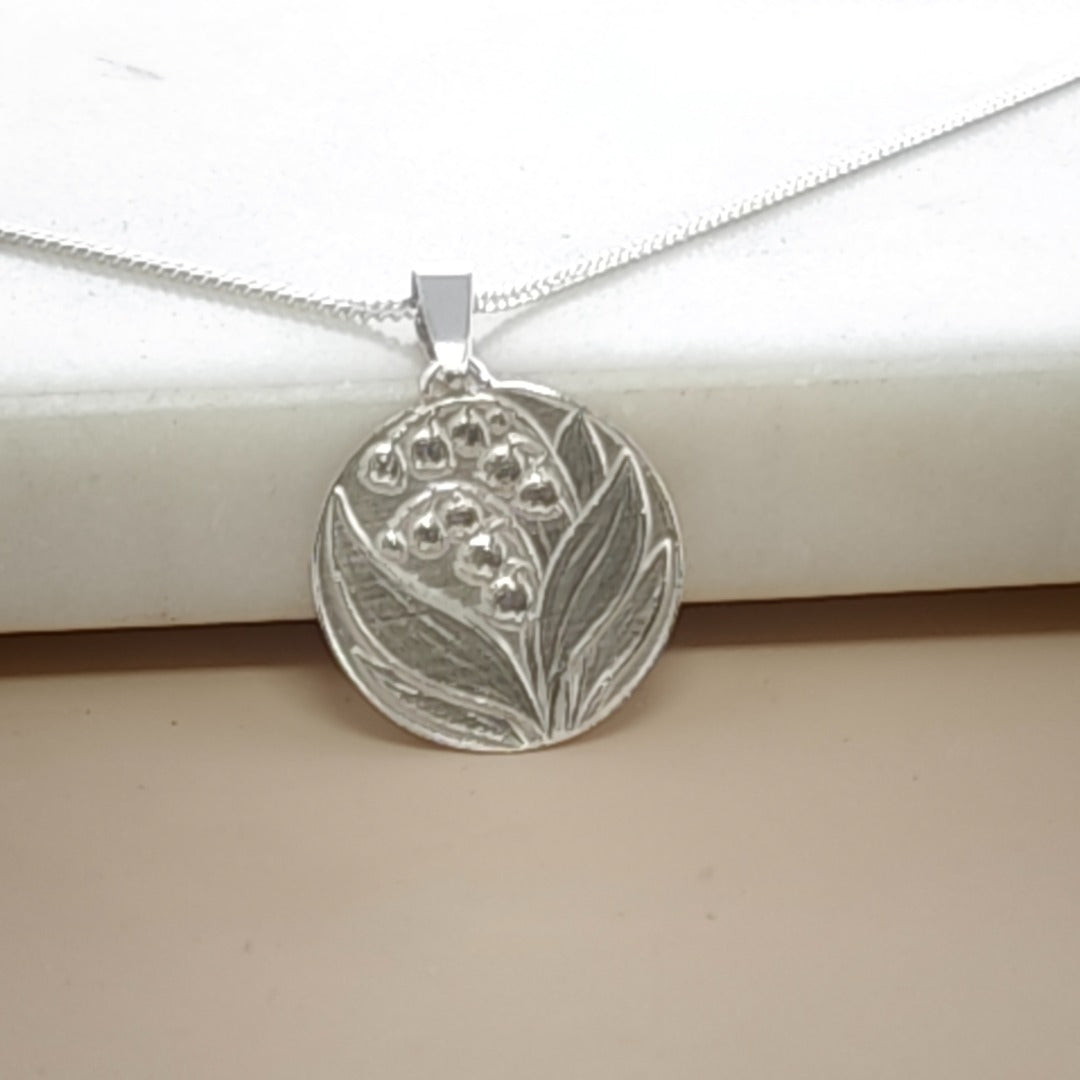 Lily of the Valley Engraved Sterling Silver Coin Necklace